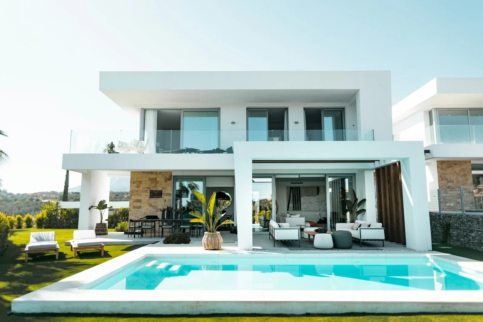 Illustrative architectural photograph of a poolside home